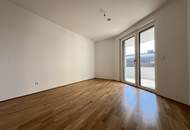 EXKLUSIVER ERSTBEZUG nahe Hauptbahnhof - Sonnige Wohnung mit großzügiger Freifläche und Küche in einem modernen Neubauprojekt