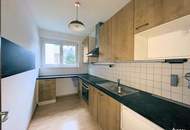 Perfekt geschnittene 2-Zimmerwohnung mit Garage in ruhiger und sonniger Lage