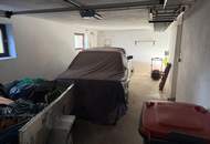 Sanierungsbedürftiges Einfamilienhaus mit großzügiger Terrasse und schönem Baumgarten