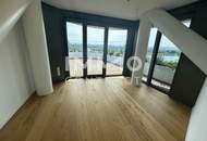 Großzügige 4 Zimmer Wohnung mit über 100 m² Balkon und Blick auf die Donau!