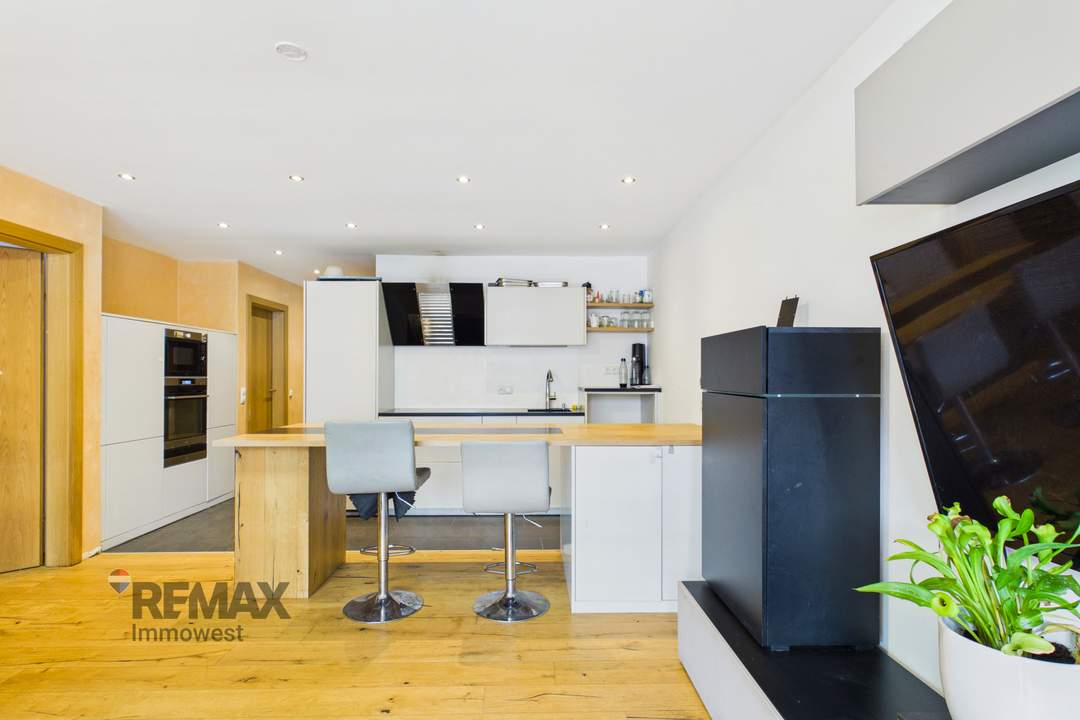 Grenznah wohnen: Moderne Terrassenwohnung für Pendler und Genießer