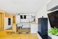 Grenznah wohnen: Moderne Terrassenwohnung für Pendler und Genießer