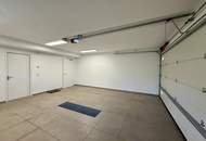 Exklusives Doppelhaushälfte mit sonniger Terrasse, Doppelgarage und Eigengarten!