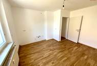 Günstige Starterwohnung in herrlicher Grünlage: praktische 1-Zimmerwohnung mit heller Wohnküche und separatem Schlafzimmer im kleinen Mehrparteienhaus – ideal für Singles, Studierende oder Pendler!