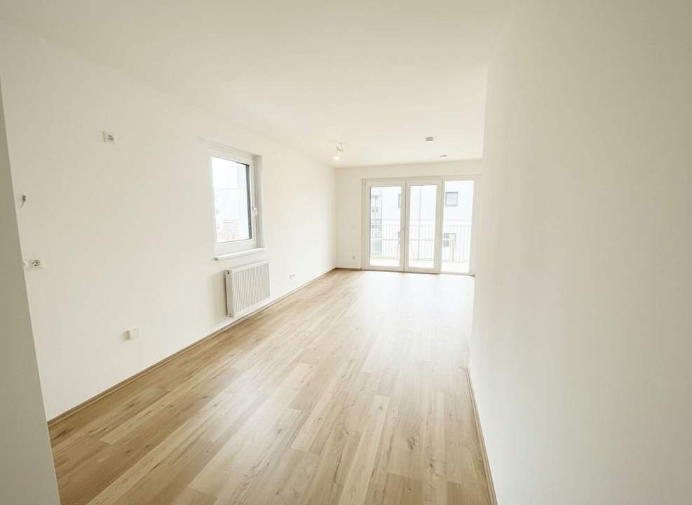 Erstbezug "ein viertel grün" – stilvolle 3-Zimmer-Wohnung mit Balkon