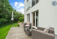 Zuhause im Grünen – Lichtdurchflutete Maisonette mit Gartenoase und Wasserblick