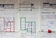 Ort der Kreativität - Ein Haus umgeben von Sandstein und viel Grün.