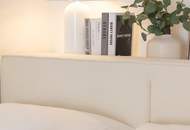 Innenarchitektonisch gestaltete 2-Zimmer-Musterwohnung mit Wohnküche und Terrasse