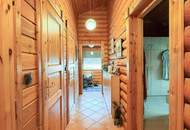 Chalet-Feeling mitten in Donaufeld - Naturstamm-Blockhaus mit Sauna, Kamin und Garten