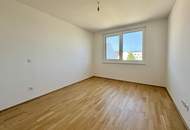 Lichtdurchflutete Dachwohnung mit offenem Wohn-Essbereich