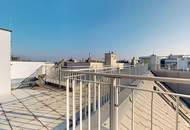Helle Dachgeschosswohnung mit Terrassen und Blick auf die Karlskirche