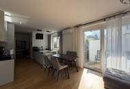 Moderne & zentrale 2-Zimmer-Eigentumswohnung mit Garten und Tiefgaragenplatz
