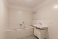 Gut aufgeteilte Praxisräumlichkeiten mit westseitigem Balkon, Eigengarten und PKW-Stellplatz