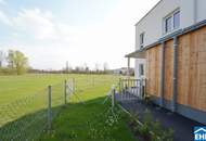 Familienglück im Grünen – nachhaltige Reihenhäuser am Kanal