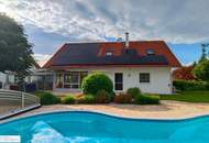 Luxusvilla mit großzügigem Garten, Pool und 3 Garagen in idyllischer Lage!