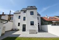 Traumhafte Dachgeschosswohnung – Erstbezug in hochwertig gebautem Wohnhaus - Klimaanlage - Moderne Küche - Gemeinschaftsgarten