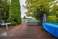 Elegantes Einfamilienhaus am See mit großzügiger Terrasse und Garten