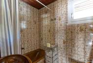 Sanierungsbedürftiges Appartementhaus mit Blick zum Weissensee inkl. 2428 m2 bebaubarem Grundstück