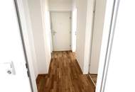 Moderner Rückzugsort für Familien & Naturfans: helle Wohnküche, 3 Schlafzimmer und ein hochwertiges Bad vereinen Komfort, Stil und urbanes Lebensgefühl auf kompaktem Raum!