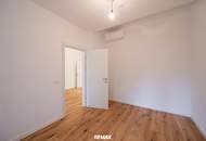 Sanierter Altbau mit modernem Neubau