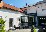 Einfamilienhaus mit Garage & Wintergarten in Ortsrandlage
