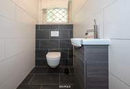 Unterkellerter Bungalow mit traumhaftem Garten u. Doppelgarage in zentraler Lage!