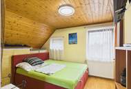 Entzückendes Zweifamilienhaus mit Pool, traumhaftem Garten und Garage in toller Lage in Tribuswinkel zu kaufen!