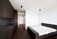 ERSTBEZUG: Elegant möbliertes Studio mit Cityblick: Doorman, Gym, Spa, Pool, Lounges - Internet inkl