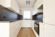 Exklusive Dachgeschoss-Maisonette mit supergroßer Terrasse und wunderbarem Fernblick & Tiefgaragenparkplatz