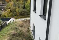 Modernes Zweifamilienhaus mit Gartenwohnungen – Erstbezug!