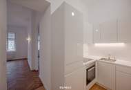 Sanierter Altbau mit modernem Neubau