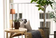Innenarchitektonisch gestaltete 2-Zimmer-Musterwohnung mit Wohnküche und Terrasse