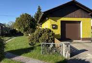 Bungalow mit Garten, Garage und Ausblick