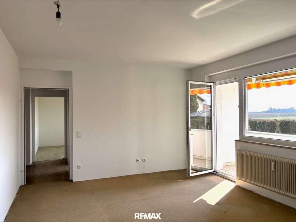 Gemütliche Erdgeschosswohnung mit Balkon, Parkplatz & Keller!
