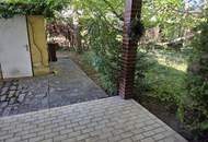 Bungalow mit Garage und großem Garten in Badener Grünruhelage!
