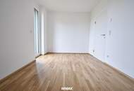 Exklusive Neubauwohnung mit moderner Küche, 37 m² Balkon und TG-Stellplatz in sonniger Lage!