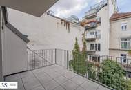 Urbaner Wohnkomfort mit Charme und Grünblick – stilvolle 3-Zimmer-Wohnung mit Balkon in ruhiger Innenhoflage