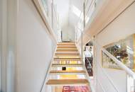 Luftiges Familien-Penthouse mit Ateliercharakter, großen Terrassen und Grünblick