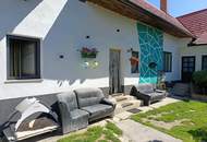 Vielseitiges Wohnhaus mit großzügigem Hof und Nebengebäuden