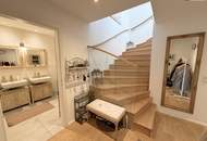 Urbaner Wohnluxus: Exklusive DG-Wohnung mit Terrasse & spektakulärem Fernblick