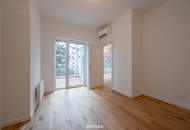 Sanierter Altbau mit modernem Neubau