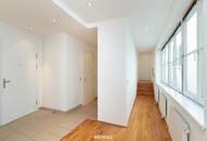 Altbau trifft Moderne – Wohnen über den Dächern