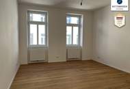 2 Zimmer-Altbau-Balkonwohnung mit Gartenblick!