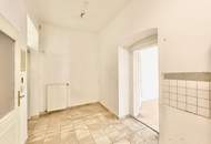 Brigittaplatz | Bezaubernde 2 Zimmer Altbau mit Potenzial &amp; Grünblick für unter € 3.650/m2