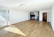 Traumlage bei der UNO-City – moderne Wohnung mit Loggia