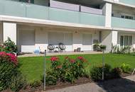 Moderne Gartenwohnung mit Terrasse in neuwertigem Wohnkomplex