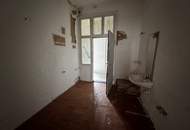 Klein, fein und zentral – Einraumwohnung im sanierten Gründerzeithaus Sanierungsbedürftig