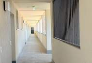 2-Zimmer-Wohnung mit großer Terrasse & 2 Stellplätzen