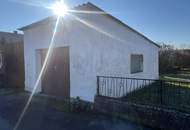 Haus in Grünruhelage mit offener Terrasse, Balkon und Garage