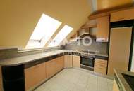 Großzügige Dachwohnung inklusive Eigengarten, Garage und Keller
